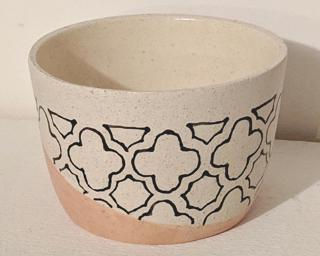 Here is a fun little planter sure to catch anyone's eye.