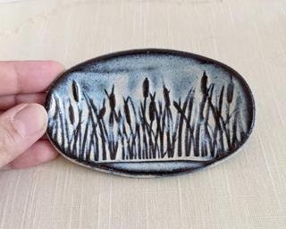 A sweet little dish for your dresser.