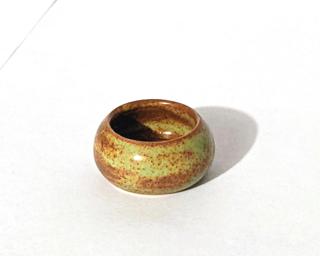 Tiny things are just the cutest, wouldn't you agree? This little planter is hardly bigger than a penny, but the colors on it are just stunning.