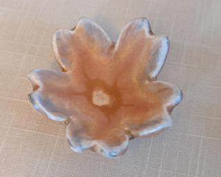 A sweet little dish for your dresser.