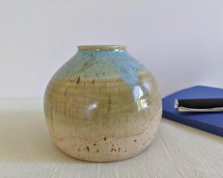 A sweet little bud vase for your shelf. small chip on bottom