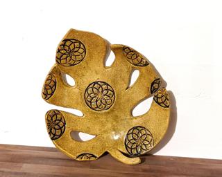 This lovely olive green monstera leaf dish would make such a sweet addition to your table or counter.