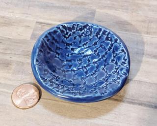 A sweet little blue dish for your dresser.