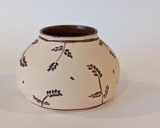 A sweet little vase for your dresser.