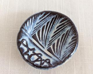 A sweet little dish for your dresser.