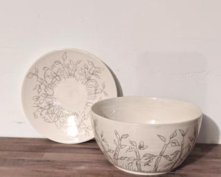 A sweet little dish to go under a planter or keep on your dresser.