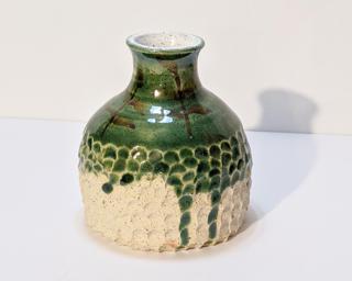 A sweet little vase for your dresser.