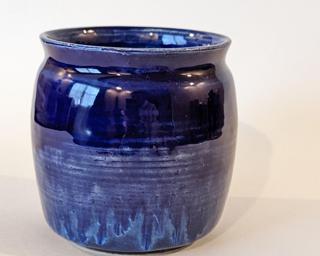 Adorn your home with this one of a kind little vase.