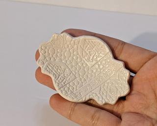 A sweet little dish for your dresser.