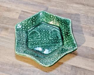 A sweet little dish for your dresser.