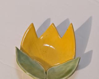 A sweet little dish for your dresser.