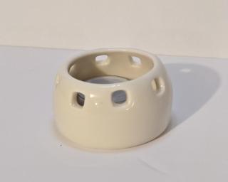 A lovely little summer candle holder for your table. Small cracks at the bottom but still completely functional.