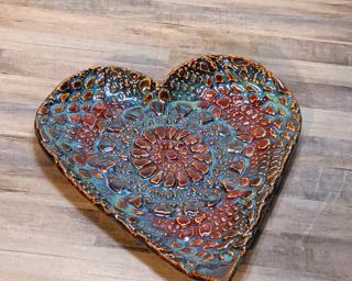 A sweet little textured heart dish for your dresser.