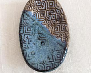 A sweet little dish for your dresser.