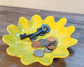 A wonderfully bright dish for your dresser.