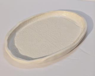A sweet little dish for your dresser.