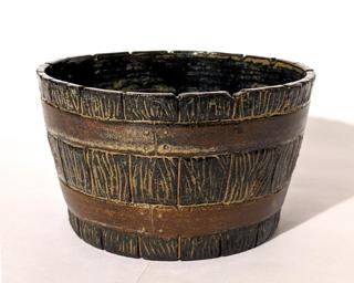 Adorn your home with this one of a kind glazed planter.