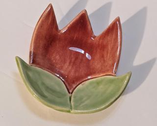 A sweet little dish for your dresser.